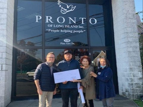 (L-R) Michael Loeffer, Greybarn’s Community Director; Carlos Cruz, Board President of Pronto; Claudia Mazzola, Director of Community Relations and Vivian Hart, Executive Director of Pronto.