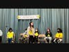 Olivia Hang, grade 5, on stage at the Landing Elementary School Spelling Bee.