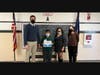 Hadee Jaffar, grade 5 student at Connolly School, stands proudly with his winning certificate for coming in first place at the Connolly School Spelling Bee.