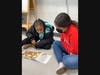 Lawrence Elementary students reading aloud to each other