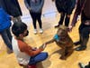 Connolly Elementary School students with Maddie, a therapy dog that meets with students twice a month to help reduce stress. 