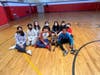 Connolly Elementary School students with Maddie, a therapy dog that meets with students twice a month to help reduce stress. 