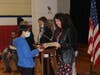 Superintendent of Schools Dr. Maria Rianna presenting pins and certificates to Student Council members
