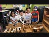 Lawrence Early Childhood Center students worked together to build a vegetable market made out of blocks for Work Together Wednesday