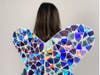 Lizbeth and Anoushka created glistening fairy wings using broken CDs. 