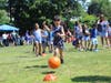 Gribbin Elementary School recently held its annual field day with the Long Island Rough Riders soccer team, whose players led students through a series of exercises like the soccer ball dribbling relay pictured above. 