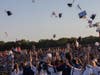 Students threw their graduation caps in the air at the close of the ceremony. 