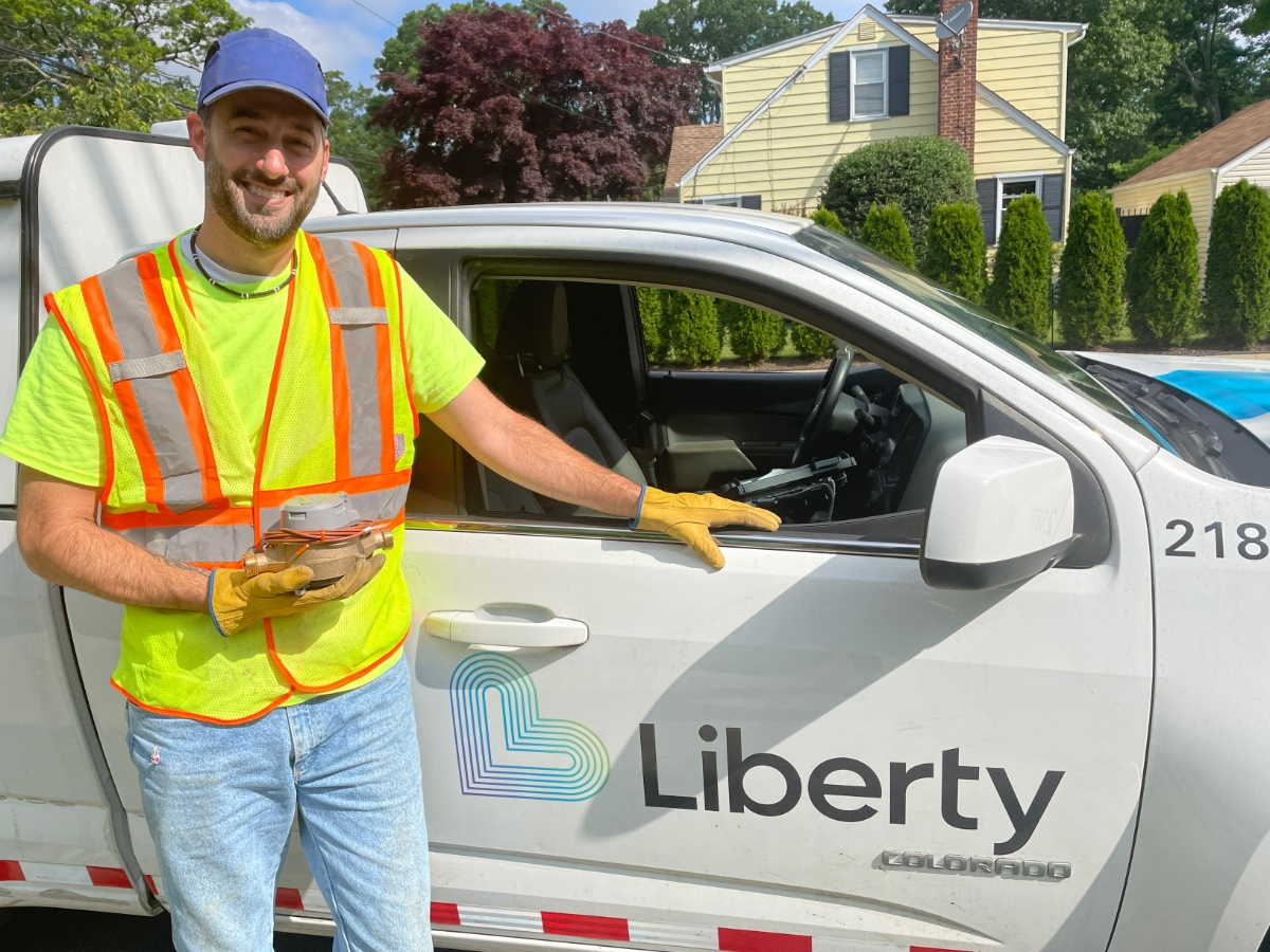 A Liberty field service representative gets ready to install the Advanced Metering Infrastructure (AMI) at a residence in Merrick, NY. 