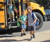 Students at Andrew Muller Primary School displayed beaming smiles as they got off their buses on the first day of school in the Miller Place School District on September 1. 