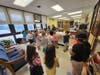 Another stop on their hunt was the school’s front desk. 