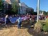 Lawrence Elementary School students with Superintendent Dr. Ann Pedersen and Principal Beckmann helping during the ceremonial changing of the flag
