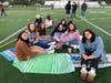 Riverhead High School seniors inaugurate the school year by watching the sunrise together