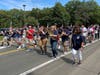 The Miller Place High School marching band led the parade from the Miller Place Fire Department South to the high school’s Stadium Field. 