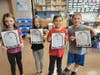 The students also created a “graveyard of dull words” with tombstones on which they listed more descriptive synonyms as “surviving loved ones.”  