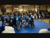 The Riverhead High School football team jumps in excitement
