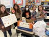 The School Improvement Team (S.I.T.) Committee at Laddie A. Decker Sound Beach School donated Thanksgiving meals to seven families in need throughou