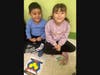 Lawrence Early Childhood Center students, Joaquin V. and Keily M. playing with shapes
