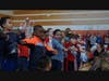 Wearing red, white and blue, the students sang patriotic songs. 