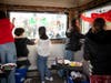 Members of the Glen Cove High School Art Club recently beautified the police booth in downtown Glen Cove for the holiday season.   