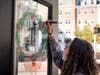 One student painted a festive wreath on a window of the booth. 