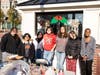 Students worked with the Downtown Business Improvement District to beautify the police booth. 