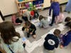 Students even worked together to create a much larger track for the small robots to follow. 