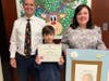 Mr. Haubrich, from left, 5th grader Michael P. and Ms. Fretto.