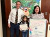 Mr. Haubrich, from left, 4th grader Alicia G. and Ms. Fretto. 