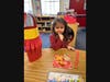  Lawrence Pre-K student with her snacks and paper lantern