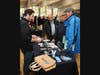 A Rachio representative shows off their newest technology to expo attendees