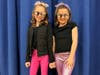 Two students wore matching outfits for their dance routine.