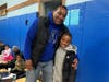 Grand Avenue Elementary School scholars attend a Read and Eat Dessert with Dad event with their father figures
