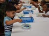 Through one STEAM activity, students experimented with the color wheel by mixing drops of different colored dyes into a bowl of milk and soap and creating new colors.    