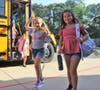 Students at Andrew Muller Primary School displayed beaming smiles as they got off their buses on the first day of school in the Miller Place School District on September 5. 