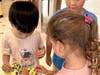 The students placed a colorful sticker on a dinosaur cut out at each scavenger hunt stop.