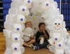 Two of Comsewogue’s youngest warriors sat in an igloo that was part of the sophomore class float. 