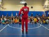 Harlem Wizard Tishean “Fresh Prince” Emmanuel speaks with Aquebogue Elementary School students