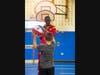 An Aquebogue Elementary School student confidently shows off his skills in front of his peers