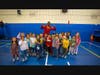 Harlem Wizard Tishean “Fresh Prince” Emmanuel with Aquebogue Elementary School students