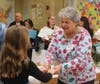 Actress Beth Dimino, who used to teach in the Comsewogue School District, was welcomed to Career Day by student ambassadors. 