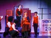The play takes place in a fictional Thebes High School. 