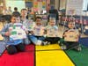 First and Second grade students at West Gates Avenue and Harding Avenue elementary schools took a “trip” around the world to see how the holidays are celebrated in different countries. 