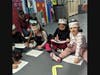 Lawrence pre-kindergarten students celebrating Peaceful Letter Day