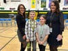 First and second place winners Thomas Stankiewicz and Ava Facilla with contest pronouncer Gina Riccuiti and Assistant Principal Dr. Jennifer Deuidicibus.