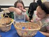 Students at Alleghany Avenue Elementary School decorate donation boxes for the Lindy Dollars for Scholars fundraiser.