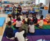 Roosevelt High School National Honor Society students recently read to Centennial Avenue Elementary School students for the 34th annual The National African American Read-In (NAARI).