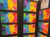 Third graders showcased their knowledge of light and dark with abstract suns and moons. 