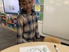 The students essentially programmed the robots by tasking them to follow the paths the students drew in markers. 