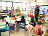 Volunteers visited Babylon Elementary and Memorial Grade schools to talk to students about their professions.