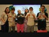 English teacher Linsday Jones, left, with her life skills students. Together, they created their own book. 